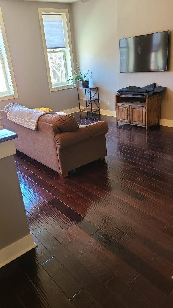 Living room with gleaming hardwood floors